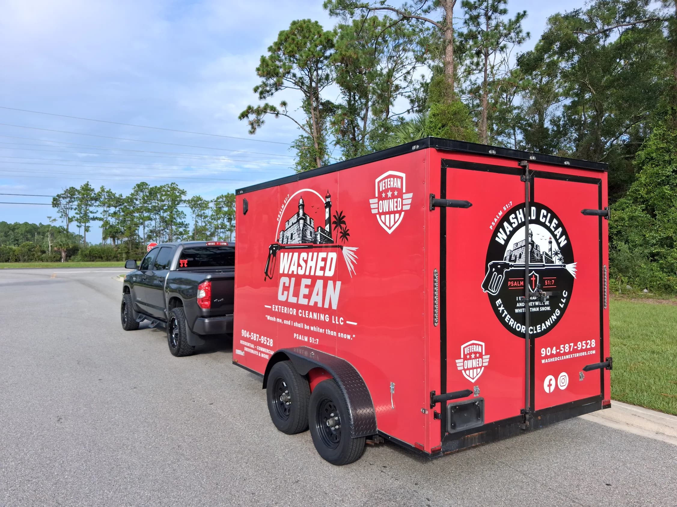 Washed Clean red commercial trailer wrap parked outdoors