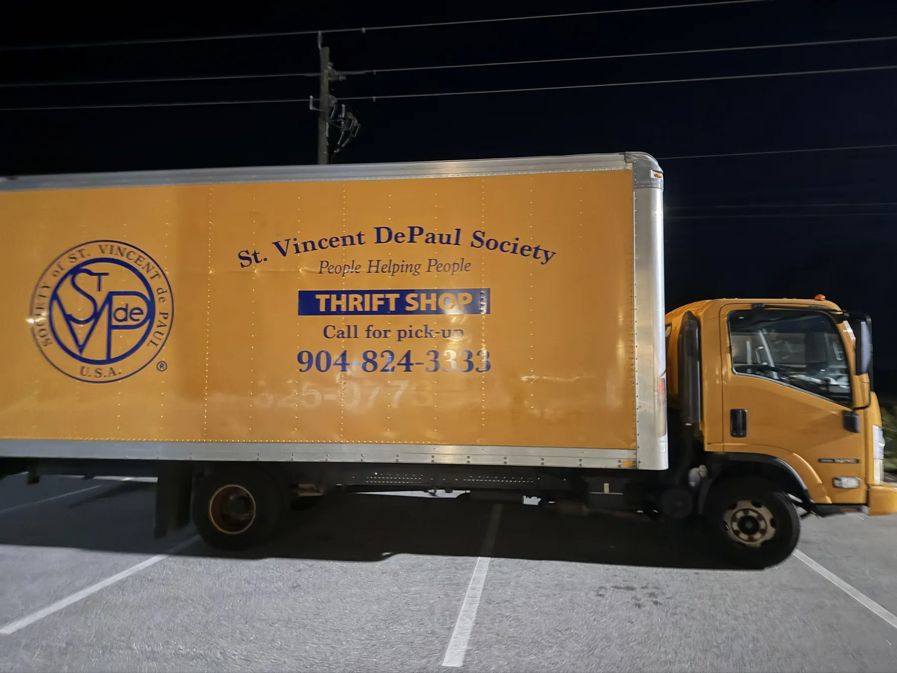 St. Vincent de Paul Society yellow box truck graphics